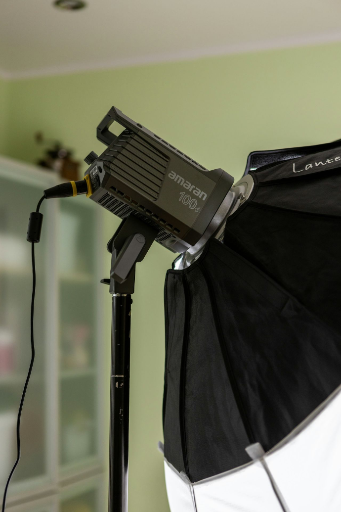a black and white umbrella and some lights